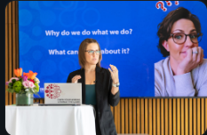 Rachel speaking at an event